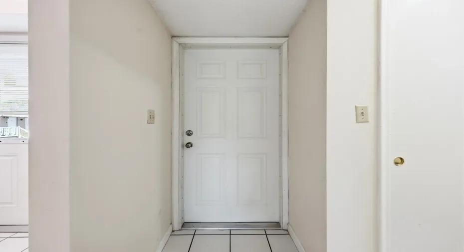 A covered front entry welcomes you home and provides a private entrance to this second-floor residence. The bright interior foyer creates a smooth transition into the main living areas while offering a convenient space for greeting guests and everyday arrivals.