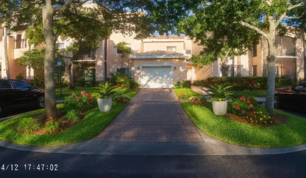 Mediterranean Home Amid Greenery and Sun