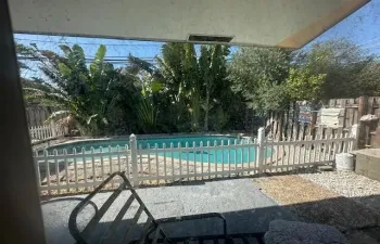 view from bedroom and kitchen. Private pool for complex
