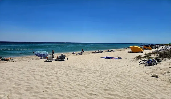 Live the sunsational beach life! Walk or bike to beach, just 1 block away from your new home.