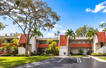 Beautiful landscaping and convenient front door assigned parking.