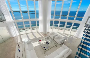 Highest 2 level townhouse Living Room water views from second floor mezzanine