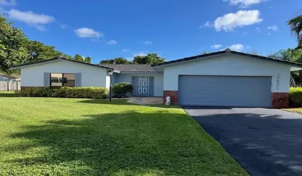 FRONT VIEW-LONG DRIVEWAY