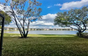 SERENE GARDEN & LAKE VIEWS FROM THE MOMENT YOU ENTER w/ ACCESS DOOR FROM PATIO TERRACE