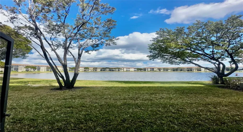 SERENE GARDEN & LAKE VIEWS FROM THE MOMENT YOU ENTER w/ ACCESS DOOR FROM PATIO TERRACE
