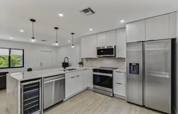 Beautiful kitchen with top of the line appliances and Cristallo counters