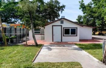 ENTRANCE WITH GARDEN/ PATIO AND ENTRANCE PATH
