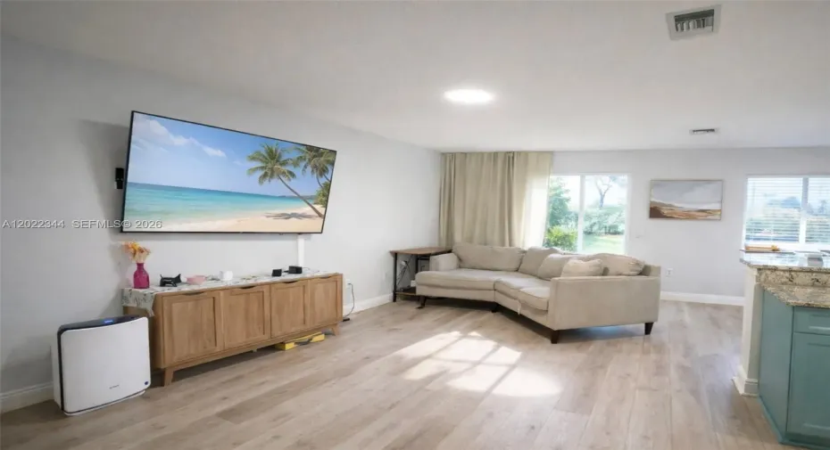 Bright resort-style community pool with tropical surroundings, relaxing lounge areas & clubhouse amenities offering the perfect South Florida lifestyle in desirable Boynton Beach.