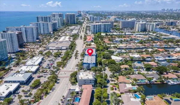Bird’s-eye view of Fort Lauderdale coastline highlighting Top of the Mile condos steps from the beach.