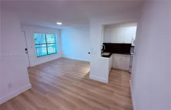 Look at the ample space created by this newly installed flooring!
