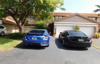 2 parking in front of the T.H