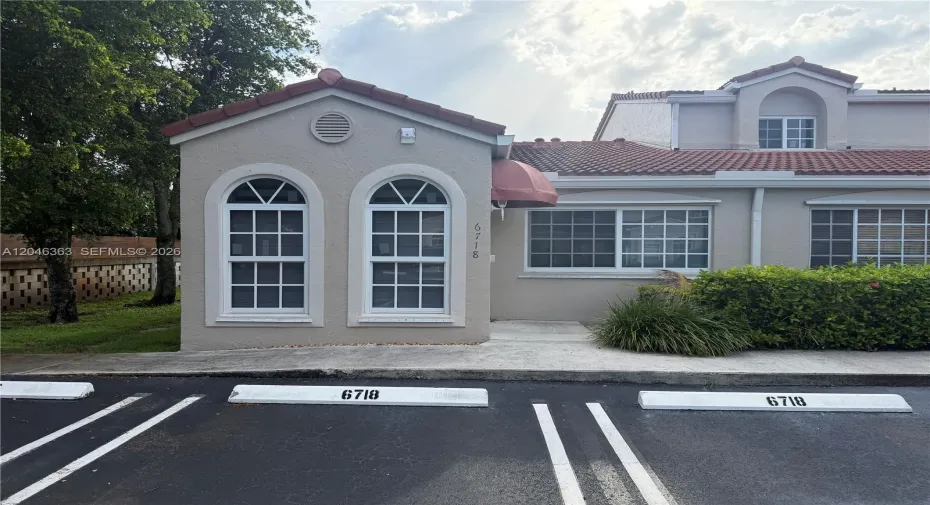 With 2 assigned spaces additional guest spaces on the side and front of unit