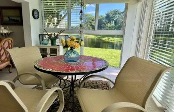 ENCLOSED PATIO WITH LAKE VIEWS