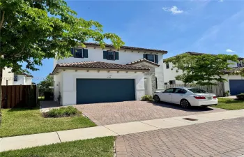 Two Car Garage with Additional Parking for 3 Cars