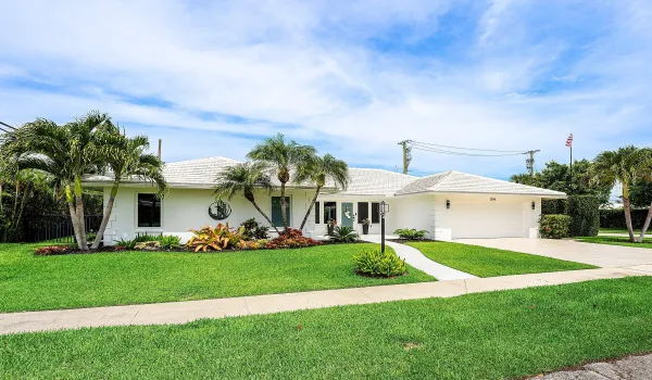 Located in the Sought-After Camino Gardens in East Boca