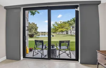 Lake view and outdoor seating from living/dining room