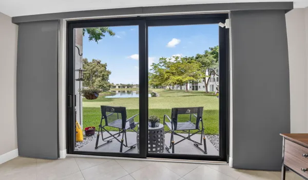 Lake view and outdoor seating from living/dining room