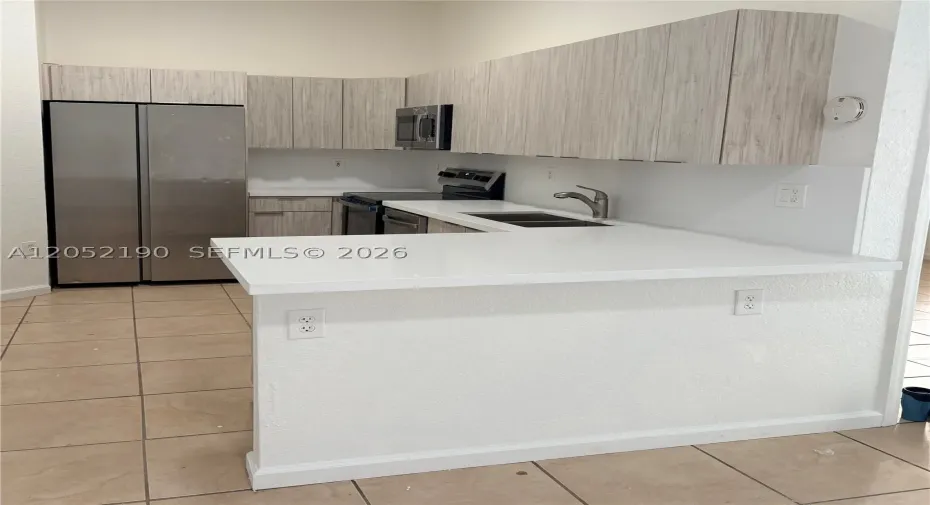 New Stove, New Microwave, New quartz countertop, new cabinets