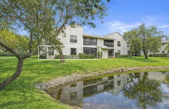 Corner unit condo over looking this peaceful pond.
