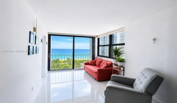 Sun-filled living space with floor-to-ceiling ocean views- your everyday backdrop.