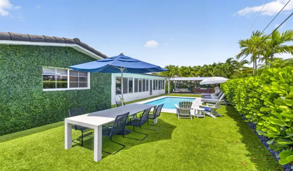 Inviting backyard with pool and summer kitchen!