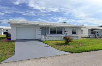 FRONT OF THIS FAIRMONT MODEL HOME WITH WALKWAY THAT GOES AROUND THE HOUSE!