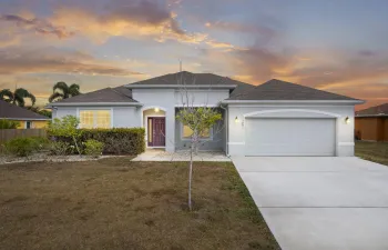 Front of Home- Colonnial Windows & 2 Car Garage