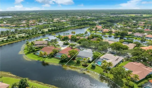 Situated on this stunning lakefront lot in Sunset Springs, a boutique Weston community, close to trendy Weston Town Center.