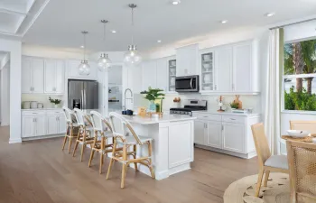 Stock photos represent builder's floorplan