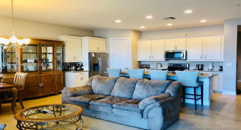 Kitchen/Living Area with Ample Ceiling Lights
