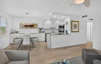 Living room, dining area and kitchen.