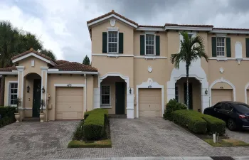 Front with 1 car garage and parking for 2 cars