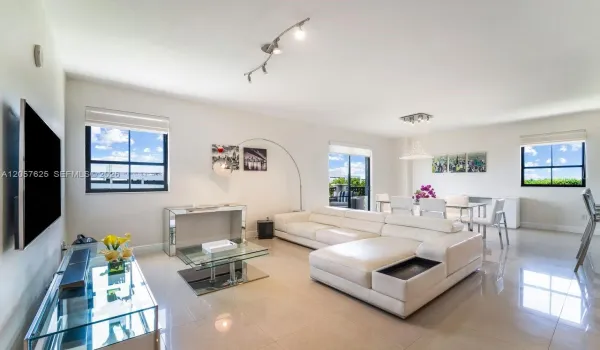 Living and Dining Room with balcony over canal