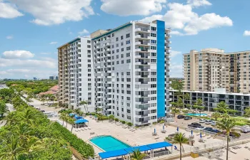 Building exterior getting painted with a modern coastal color scheme!
