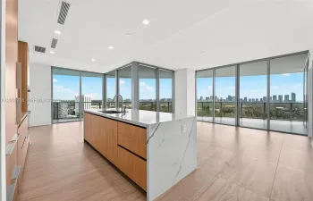Kitchen and living area with ocean, lagoon and city views