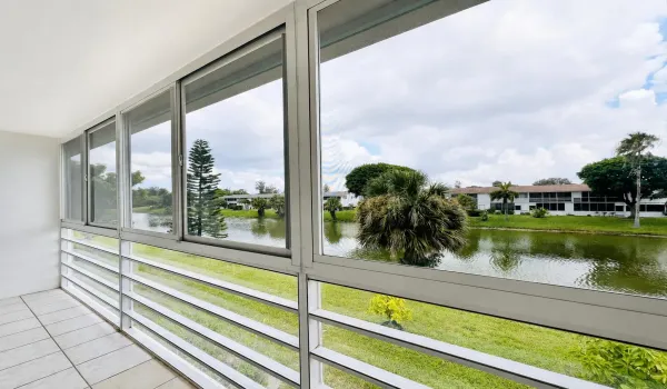 Great Price & Water Views in 55+ Century Village! Second Floor 1/1.5 With Updated Flooring!