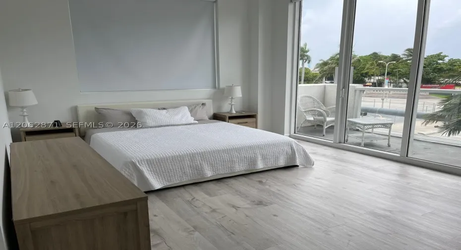 Huge master bedroom with king size bed electric black out, big balcony and walking closet