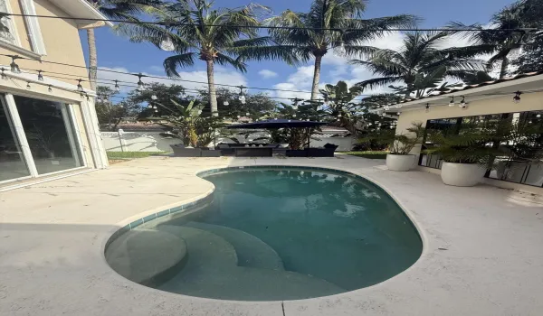 Private pool open to backyard