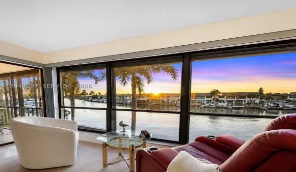 Brighten your evenings with serene WIDE WATER VIEWS and FRONT-ROW SUNSETS from the comfort of your living room