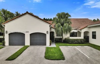 One garage, one driveway plus one extra parking space.