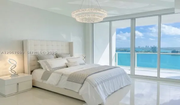 Primary Bedroom with Crystal Lighting, Custom 3-D Wallpaper, Fully-Automatic Blackout Shade, and Stunning Views