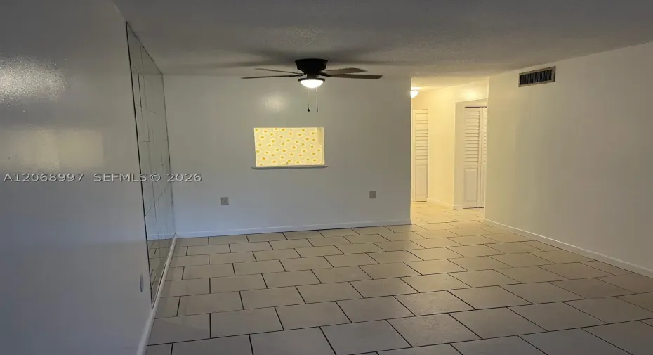 Freshly painted with new ceiling fan.