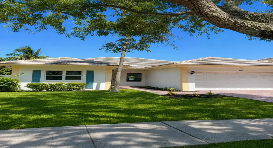 sunny_suburban_home_under_oak_trees