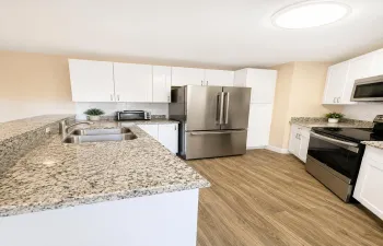 Kitchen with pantry and lots of cabinets and counterspace