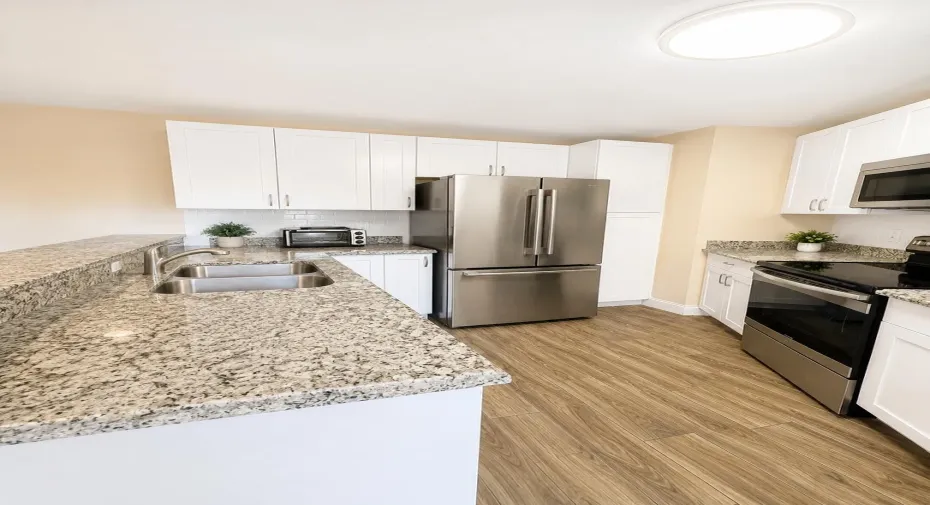 Kitchen with pantry and lots of cabinets and counterspace