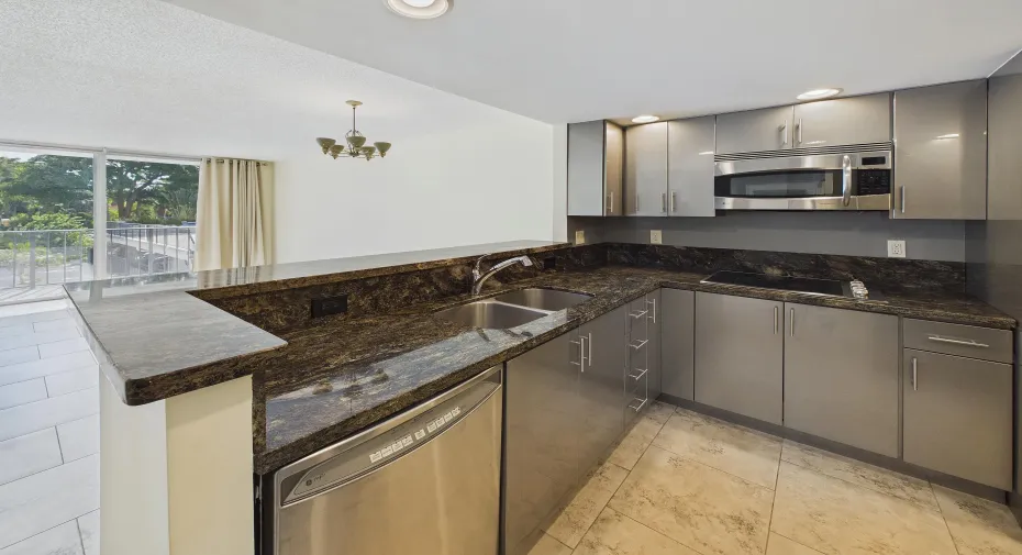 BEAUTIFUL CABINETS WITH HANDSOME GRANITE COUNTERS!