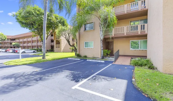 Exterior Front - Corner Unit with Parking Space in Front
