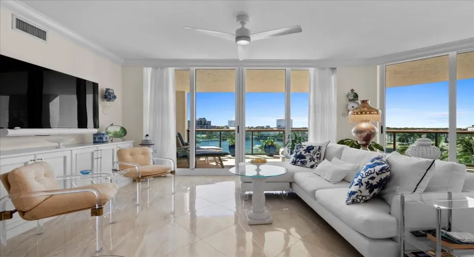 Remodeled condo with decorator high end furnishings, porcelain tile floors. Direct access to fully furnished covered large balcony