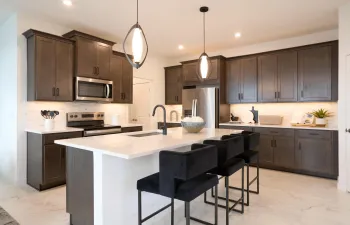 Stock photos represent builder's floorplan