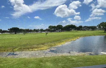 golf course and lake views from your screened in patio.